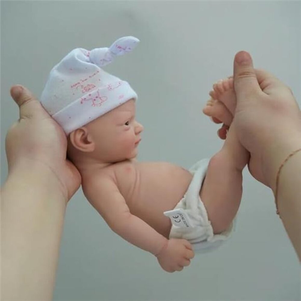 Reborn Baby Doll in Pink Printed Knot Hat and White Diaper